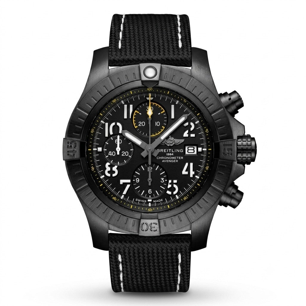 Breitling Avenger Chronograph men's watch with a black titanium case, black dial featuring white Arabic numerals, yellow-accented sub-dials, date window, and a black textile strap.
