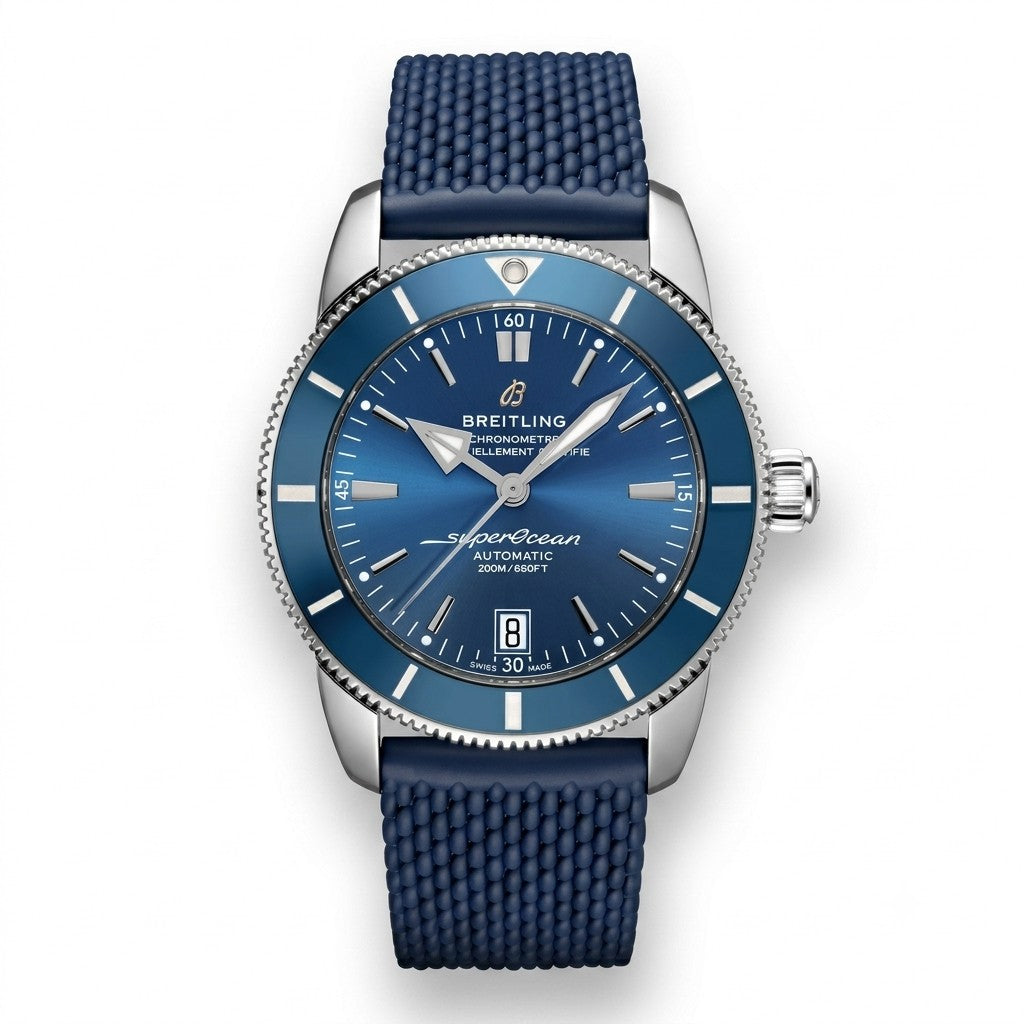 Breitling Superocean Heritage luxury automatic watch featuring a blue dial with silver-tone hands and hour markers, blue rotating bezel, stainless steel case, date display, and textured blue rubber strap.