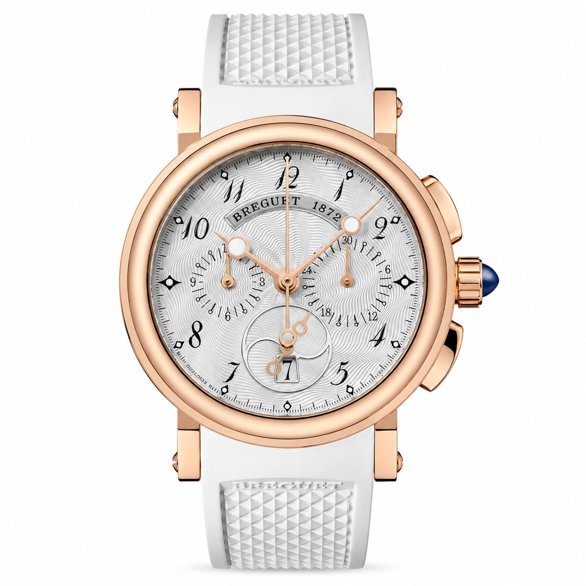 A Breguet chronograph watch with a white textured strap, a white dial with black Arabic numerals, and a rose gold case with a blue cabochon crown.