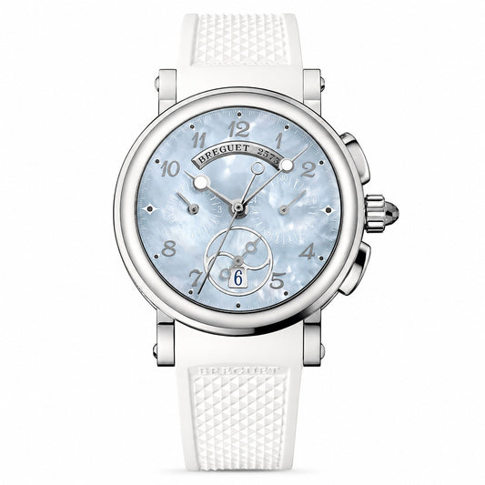 A luxury watch by Breguet, featuring a round silver-tone case, a light blue mother-of-pearl dial with Arabic numerals, and a textured white silicone strap.