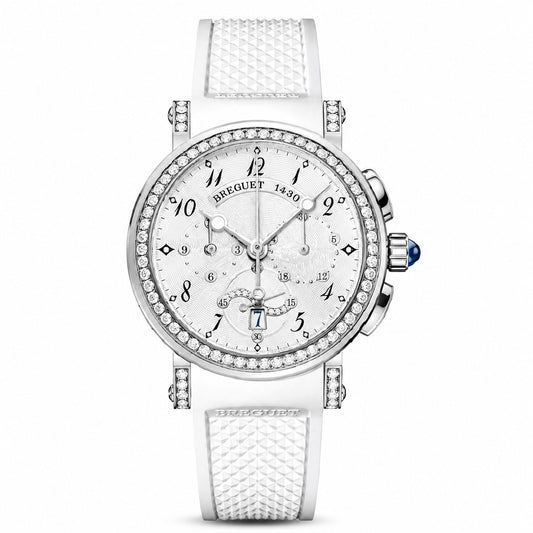 Front view of a Breguet watch with a white dial, diamond-set bezel, blue-tipped crown, and white textured strap.