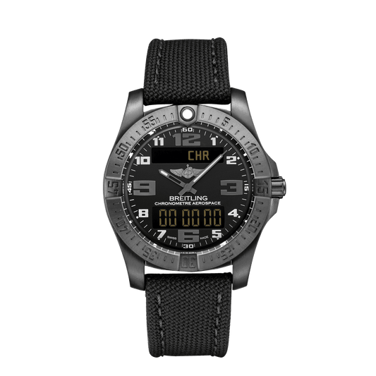 Breitling Aerospace watch with a black dial, silver-tone Arabic numerals, two digital displays, a grey metal case and black fabric strap.
