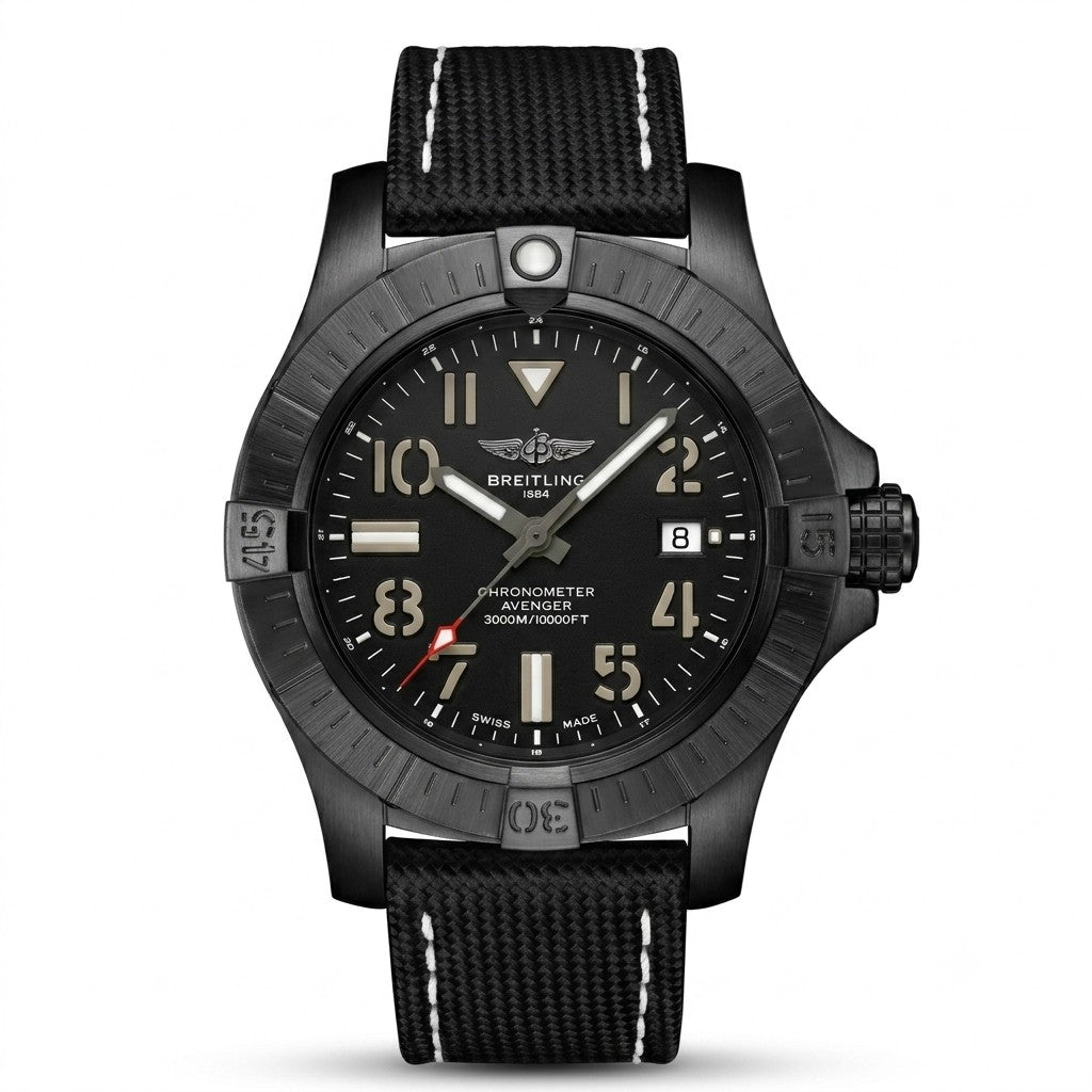 A Breitling Avenger with a black ceramic case, black dial with silver-tone indices and hands, and a black woven textile strap with white contrast stitching.