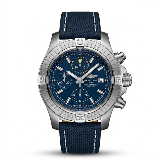 Breitling Avenger Chronograph men's watch with a stainless steel case, blue dial featuring silver baton markers, yellow-accented sub-dials, date window, and a blue textile strap.