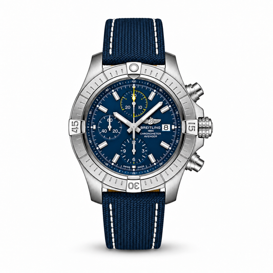 A Breitling wristwatch with a silver stainless-steel case, a deep blue dial with white and yellow accents, and a matching blue textile strap with white stitching.