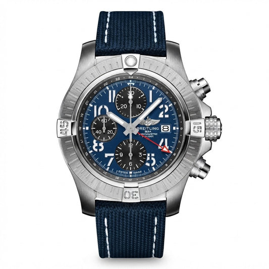 Breitling Avenger Chronograph GMT men's watch with a stainless steel case, blue dial featuring white Arabic numerals, date window, red-tipped GMT hand, and a blue textile strap."