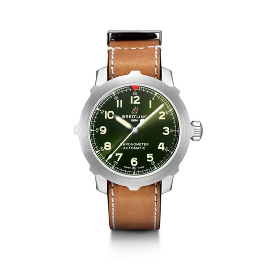 Breitling Chronometer Automatic watch with a stainless steel case, green dial, white numerals, luminous hands, and a brown leather strap with white stitching.