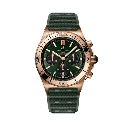 Breitling chronograph watch with a green dial, three black subdials, rose gold tone case and numbered bezel, and textured dark green strap.