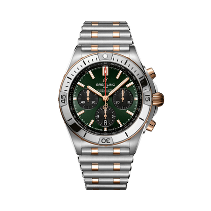 Breitling Chronomat chronograph watch with a green dial, three black subdials, rose gold tone accents, date display and two-tone metal bracelet.