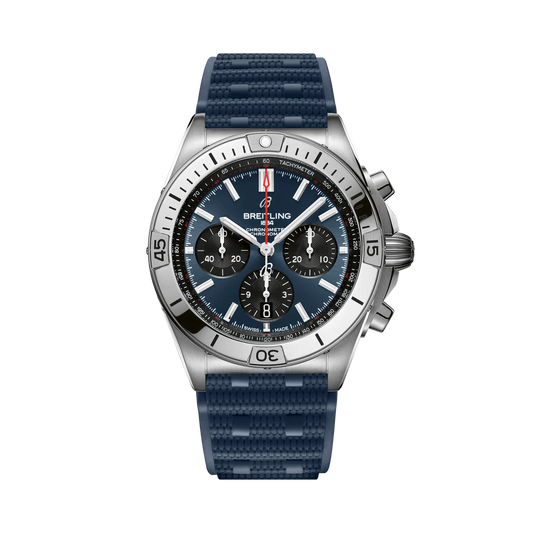 Breitling chronograph watch with a blue dial, three black subdials, red seconds hand, silver tone case and numbered bezel, and textured blue strap.