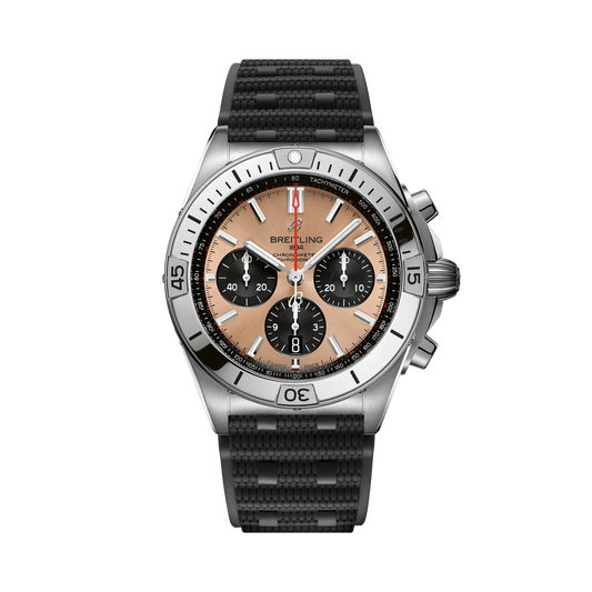 Breitling chronograph watch with a salmon dial, three black subdials, red seconds hand, silver tone case and numbered bezel, and textured black strap.