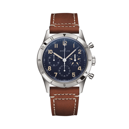 Breitling chronograph watch with a blue dial, three subdials, cream Arabic numerals, numbered silver tone bezel and brown strap with white stitching.