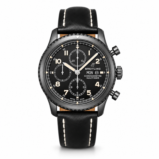 A Breitling chronograph wristwatch with a black dial, black bezel, and a black leather strap with white stitching.