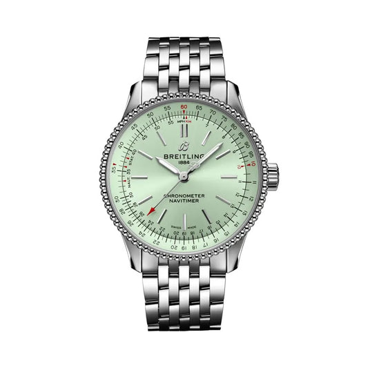 A Breitling Navitimer chronometer watch with a silver stainless steel link bracelet, a silver beaded bezel, and a pale mint green dial with white hands and red accents.