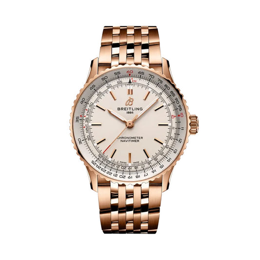 A Breitling Chronometer Navitimer watch with a rose gold metal case and integrated bracelet, featuring a white dial with black and red details.