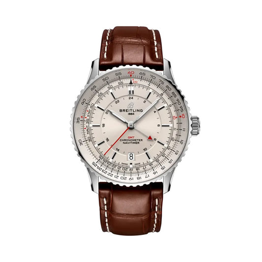 A Breitling Navvimer Off-Sea watch with a silver-tone stainless steel case, a cream-colored dial with black and red markings, and a brown leather strap with white stitching.