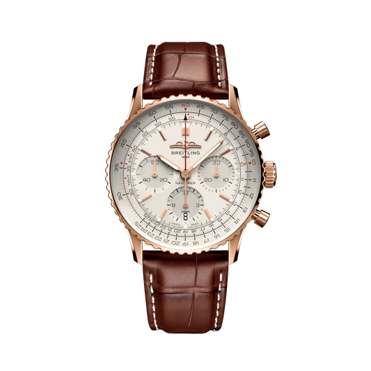 Breitling Navitimer chronograph watch with a cream dial, three silver subdials, rose gold tone case and brown leather strap with white stitching.
