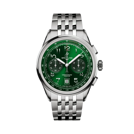 Breitling chronograph watch with a green dial, two dark subdials, Arabic numerals, date window at 6 o’clock, silver tone case and metal bracelet.
