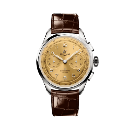 Breitling Premier B09 Chronograph 40mm with a champagne dial, two matching subdials, silver Arabic numerals, silver tone case and brown leather strap.