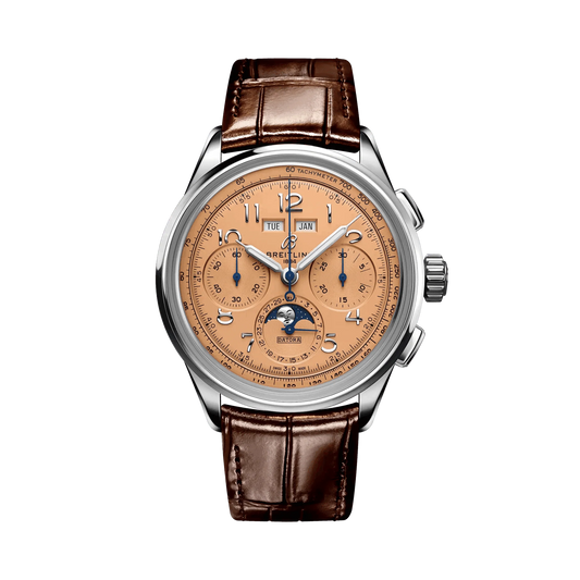 Breitling Premier chronograph watch with a salmon dial, three subdials, moon phase display, calendar windows, silver tone case and brown leather strap.