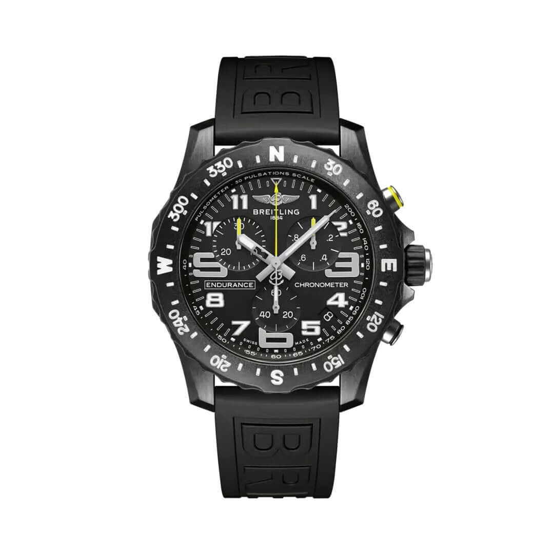 Breitling Endurance Pro chronograph watch featuring a black dial, black compass bezel, three chronograph subdials, luminous numerals, yellow accents date display, and black rubber strap.