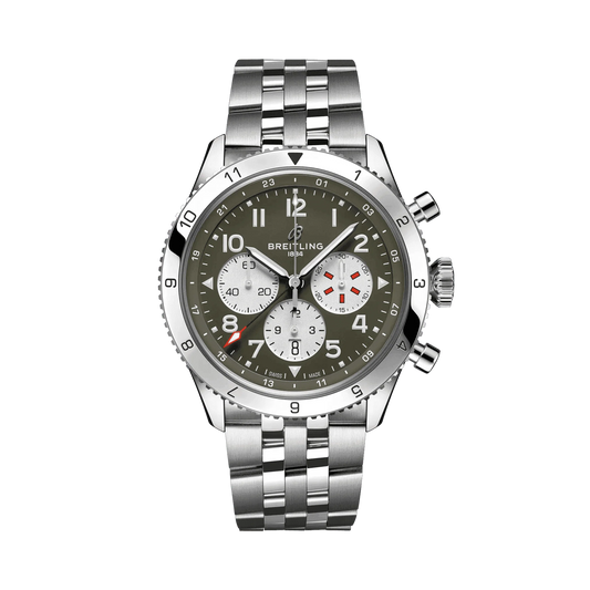 Breitling chronograph watch with an olive green dial, three silver subdials, Arabic numerals, red accents, numbered silver tone bezel and metal bracelet.