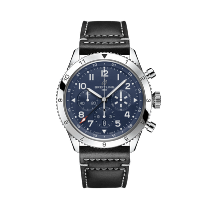 Breitling chronograph watch with a blue dial, three subdials, Arabic numerals, silver tone numbered bezel and black leather strap with white stitching.