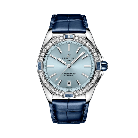 Breitling Chronomat watch with a light blue dial, diamond-set bezel, silver tone case and navy blue leather strap.