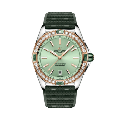 Breitling Chronomat watch with a mint green dial, diamond-set rose gold tone bezel, silver tone case and textured dark green strap.
