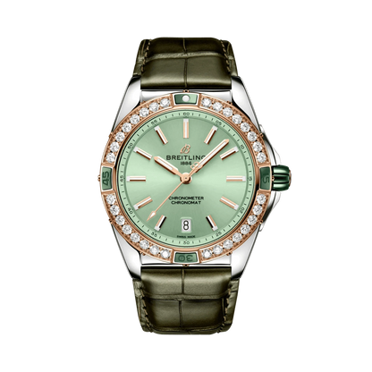 Breitling Chronomat watch with a mint green dial, diamond-set rose gold tone bezel, green accents, date display and dark green leather strap.