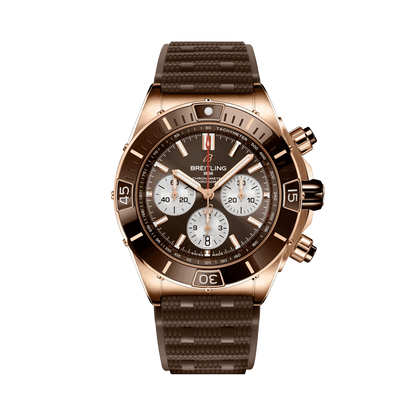 Breitling chronograph watch with a brown dial, three silver subdials, rose gold tone case, brown numbered bezel and textured brown strap.