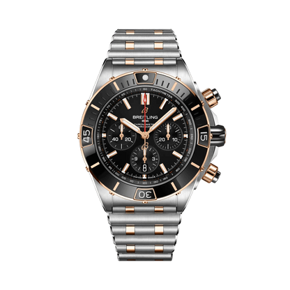 Breitling Chronomat chronograph watch with a black dial, three black subdials, rose gold tone accents, date display and two-tone metal bracelet.