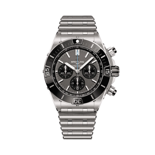 Breitling Chronomat chronograph watch with a grey dial, three black subdials, date display, silver tone bezel and metal bracelet.