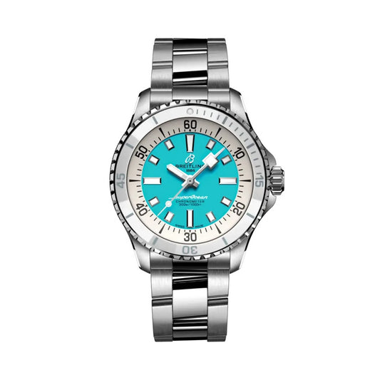 Breitling Superocean Automatic  with a stainless steel link bracelet, featuring a white bezel, a vibrant turquoise dial, and silver-tone hands and indices.