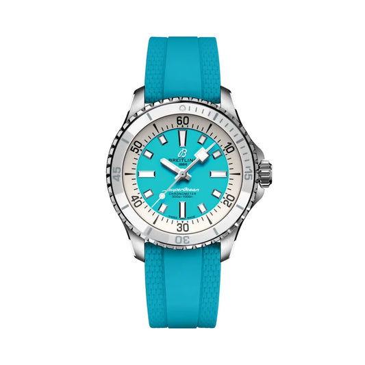 Breitling Superocean Automatic watch with a stainless steel case, turquoise dial featuring white baton markers, silver bezel, and a turquoise rubber strap.