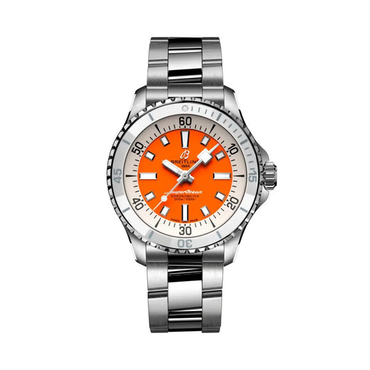 Breitling Superocean Automatic watch with a stainless steel case and bracelet, orange dial featuring white baton markers, and a silver bezel.