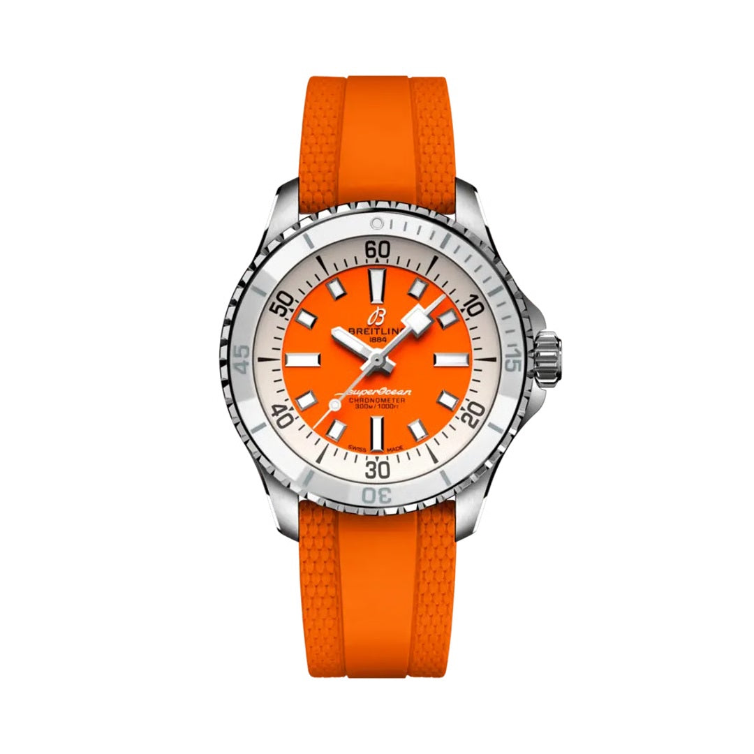 Breitling Superocean Automatic watch with a stainless steel case, orange dial featuring white baton markers, silver bezel, and an orange rubber strap.