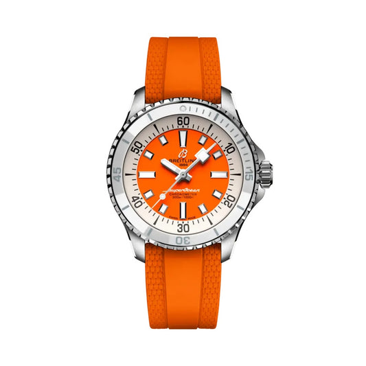 Breitling Superocean Automatic watch with a stainless steel case, orange dial featuring white baton markers, silver bezel, and an orange rubber strap.