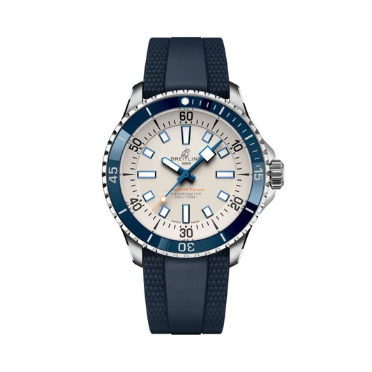 Breitling Superocean Automatic watch with a stainless steel case, white dial featuring blue baton markers, blue bezel, and a blue rubber strap.
