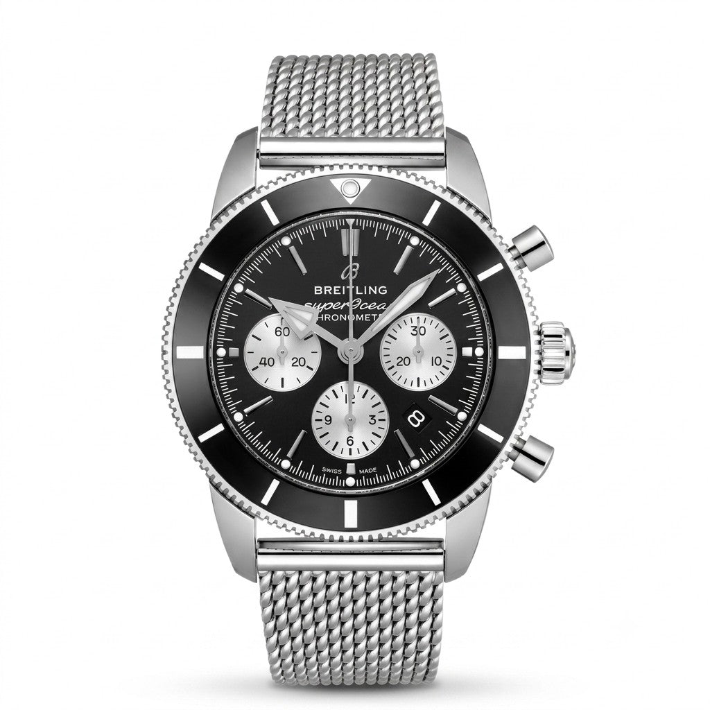 Breitling Superocean Heritage luxury chronograph watch featuring a black dial with three silver subdials, silver-tone hands and hour markers, black rotating bezel, stainless steel case, date display, and stainless steel mesh bracelet.