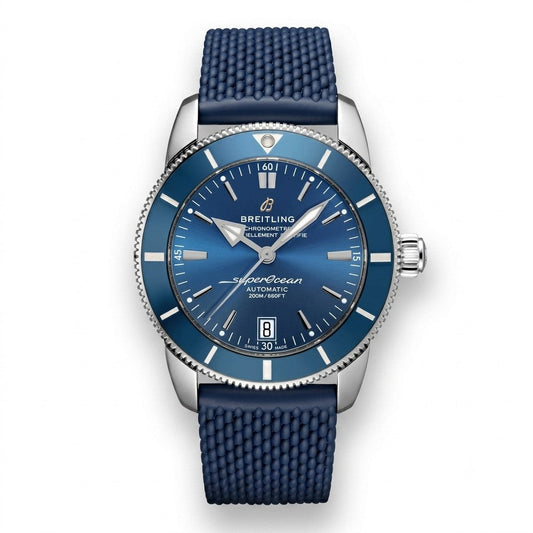 Breitling Superocean Heritage luxury automatic watch featuring a blue dial with silver-tone hands and hour markers, blue rotating bezel, stainless steel case, date display, and textured blue rubber strap.