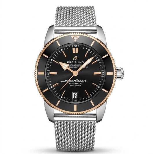 Breitling Superocean Heritage B20 Automatic wristwatch featuring a stainless steel case, black dial with rose gold baton indices and hands, black and rose gold unidirectional bezel, date window at 6 o'clock, and stainless steel mesh bracelet.