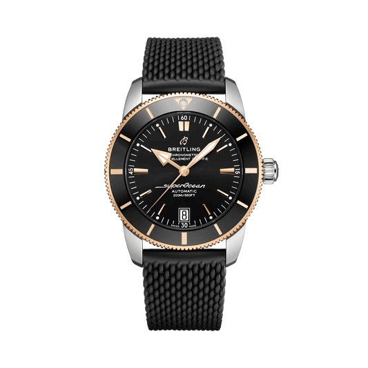 Breitling Superocean Heritage watch with a black dial, rose gold-tone details, date display and black textured strap.