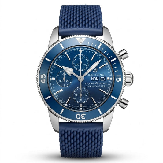  Breitling Superocean Heritage luxury chronograph watch featuring a blue dial with three subdials, silver-tone hands and hour markers, blue rotating bezel, stainless steel case, and textured blue rubber strap.