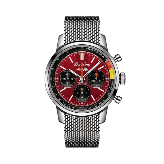 Breitling chronograph watch with a red dial, three black subdials, silver-tone case and mesh metal bracelet.