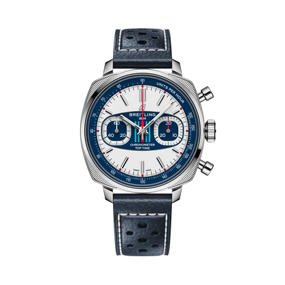 Breitling chronograph watch with a white dial, two blue subdials, blue outer ring, silver tone cushion-shaped case and perforated navy leather strap with white stitching.