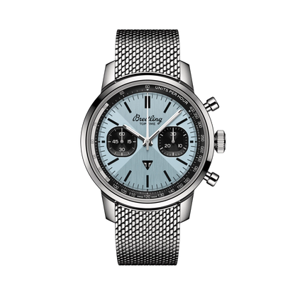 Breitling chronograph watch with a light blue dial, two black subdials, silver tone case and mesh metal bracelet.