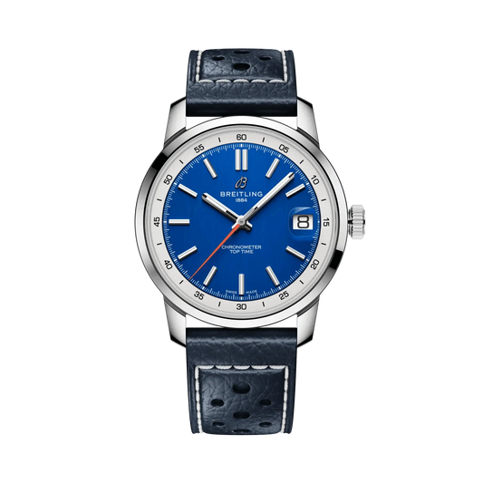 Breitling watch with a blue dial, silver tone case and numbered bezel, date display and perforated navy leather strap with white stitching.