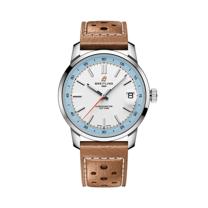 Breitling watch with a white dial, light blue numbered bezel, silver tone case, date display and perforated tan leather strap with white stitching.