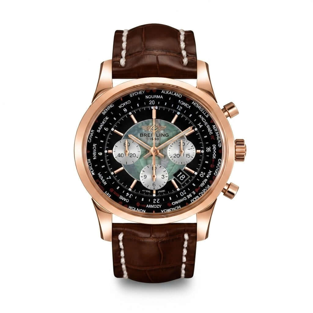 Breitling Transocean Chronograph Unitime watch featuring a polished rose gold case, black and silver dial with world time city ring, three white sub-dials, date window, and a brown leather strap with white stitching."